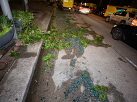 Shattered glass is covering the roads of downtown Houston, Texas, on May 16, 2024. (