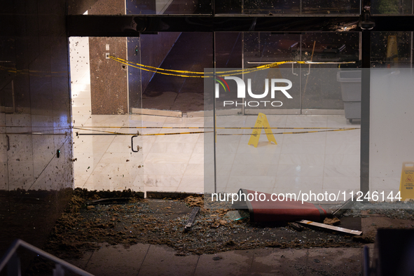 The entrance to Wells Fargo Plaza in Houston, Texas, is being damaged by 70-100mph winds on May 16, 2024. 