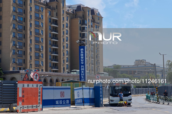 The area around the construction site where a fire is breaking out is now returning to normal in Shanghai, China, on May 17, 2024. 