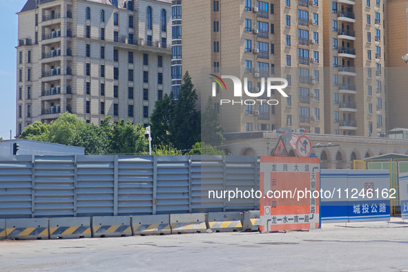 The area around the construction site where a fire is breaking out is now returning to normal in Shanghai, China, on May 17, 2024. 