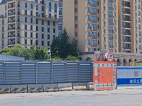 The area around the construction site where a fire is breaking out is now returning to normal in Shanghai, China, on May 17, 2024. (