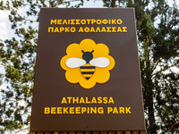 The sign at the entrance of the park is being seen first by visitors in Nicosia, Cyprus, on April 12, 2024. Bees are being considered a valu...