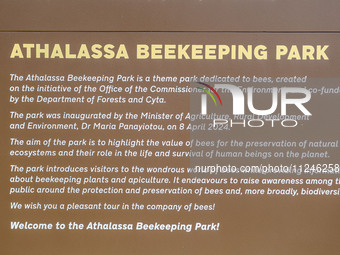 A sign is being seen at the entrance of the park in Nicosia, Cyprus, on April 12, 2024. Bees are being considered a valuable species for the...