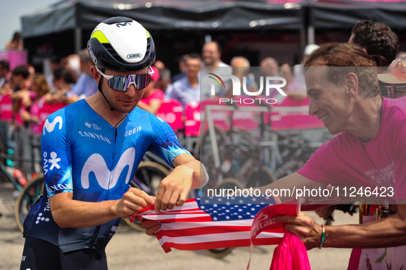 Pelayo Sanchez of Spain and Movistar Team signing autographs to fans prior to the 107th Giro d'Italia 2024, Stage 12, a 193km stage from Mar...