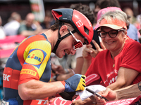 Simone Consonni of Italy and Team Lidl - Trek signing autographs to fans prior to the 107th Giro d'Italia 2024, Stage 12, a 193km stage from...