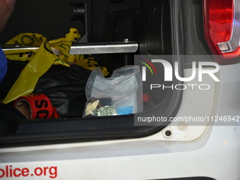 Evidence is being collected from the crime scene and placed in the back of a Chicago police car. A 31-year-old male is in critical condition...