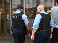 Police officers are entering Eataly. A large police presence is occurring after an assault at Eataly Italian Restaurant in Chicago, Illinois...