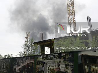 A pillar of smoke is rising over the city after the shelling of Russian troops in Kharkiv, Ukraine, on May 17, 2024. NO USE RUSSIA. NO USE B...