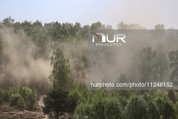 Dust moves with a wind in a forest as dust-roads are extremely dry in Drawsko Pomorskie county, western Poland on May 17, 2024. Public was i...