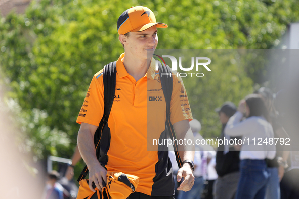 Oscar Piastri of Australia and McLaren MCL38 Mercedes are arriving at the circuit prior to the Free Practice of the Formula 1 Gran Premio de...