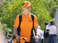 Oscar Piastri of Australia and McLaren MCL38 Mercedes are arriving at the circuit prior to the Free Practice of the Formula 1 Gran Premio de...