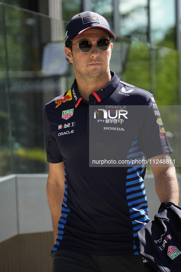 Sergio Perez of Mexico and Oracle Red Bull Racing RB20 are arriving at the circuit prior to the Free Practice of the Formula 1 Gran Premio d...