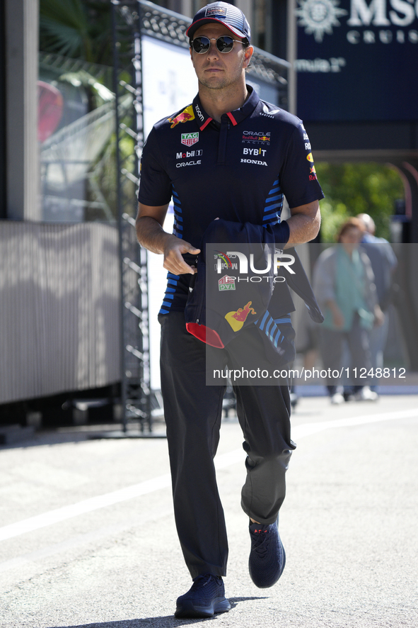 Sergio Perez of Mexico and Oracle Red Bull Racing RB20 are arriving at the circuit prior to the Free Practice of the Formula 1 Gran Premio d...