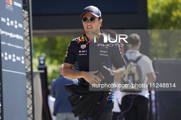 Sergio Perez of Mexico and Oracle Red Bull Racing RB20 are arriving at the circuit prior to the Free Practice of the Formula 1 Gran Premio d...