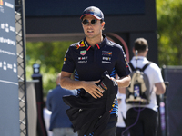 Sergio Perez of Mexico and Oracle Red Bull Racing RB20 are arriving at the circuit prior to the Free Practice of the Formula 1 Gran Premio d...