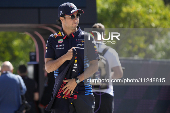 Sergio Perez of Mexico and Oracle Red Bull Racing RB20 are arriving at the circuit prior to the Free Practice of the Formula 1 Gran Premio d...