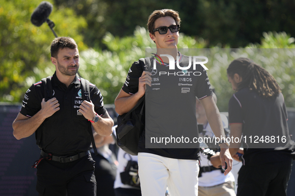 George Russell of England and the Mercedes AMG Petronas F1 Team W15 are arriving at the circuit prior to the Free Practice of the Formula 1...