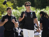 George Russell of England and the Mercedes AMG Petronas F1 Team W15 are arriving at the circuit prior to the Free Practice of the Formula 1...