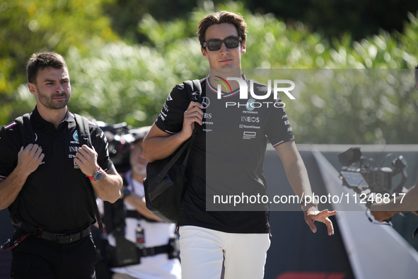 George Russell of England and the Mercedes AMG Petronas F1 Team W15 are arriving at the circuit prior to the Free Practice of the Formula 1...