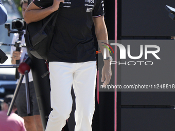 George Russell of England and the Mercedes AMG Petronas F1 Team W15 are arriving at the circuit prior to the Free Practice of the Formula 1...