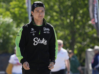 Zhou Guanyu of China and Kick Sauber C44 Ferrari are arriving at the circuit prior to the Free Practice of the Formula 1 Gran Premio del Mad...