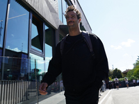 Daniel Ricciardo of Australia and Visa Cash App RB VCARB 01 are arriving at the circuit prior to the Free Practice of the Formula 1 Gran Pre...