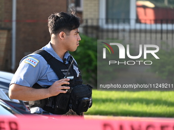 A police officer is on the scene of the homicide investigation. A 54-year-old male victim is being shot in the chest and killed while inside...