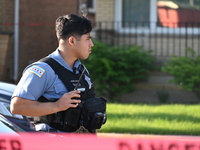 A police officer is on the scene of the homicide investigation. A 54-year-old male victim is being shot in the chest and killed while inside...