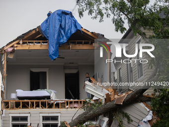 A house at Ashland St. and 27th St. in the Houston Heights is being seen destroyed after a severe storm in Houston, Texas, on May 17, 2024....