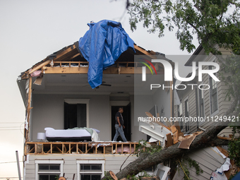 A house at Ashland St. and 27th St. in the Houston Heights is being seen destroyed after a severe storm in Houston, Texas, on May 17, 2024....