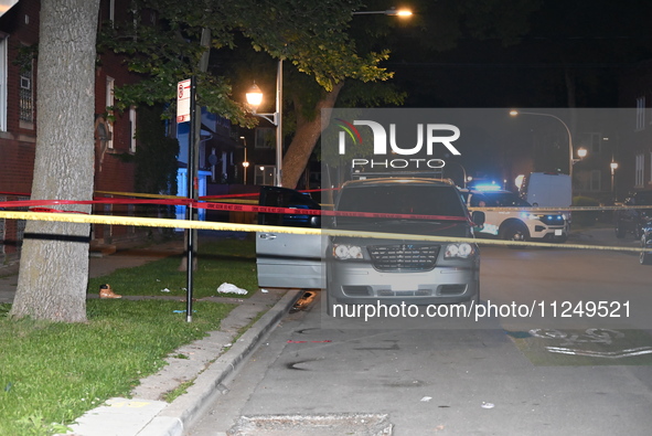 The victim's vehicle and belongings are being found at the crime scene. A male victim is being shot in Chicago, Illinois, United States, on...