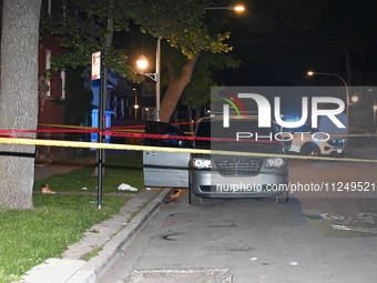 The victim's vehicle and belongings are being found at the crime scene. A male victim is being shot in Chicago, Illinois, United States, on...