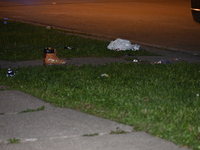 Police are finding the belongings of the victim at the crime scene. A male victim is being shot in Chicago, Illinois, United States, on May...