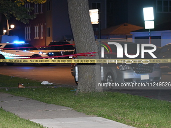 The victim's vehicle and belongings are being found at the crime scene. A male victim is being shot in Chicago, Illinois, United States, on...