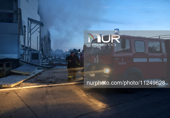 Rescuers are working at a civil enterprise damaged by a Russian missile attack in Odesa, Ukraine, on May 17, 2024. 