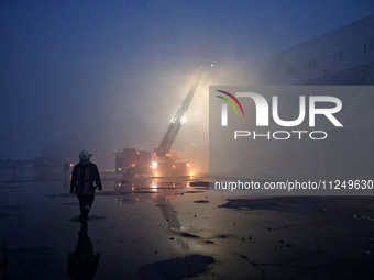 A rescuer is working at a civil enterprise damaged by a Russian missile attack in Odesa, Ukraine, on May 17, 2024. NO USE RUSSIA. NO USE BEL...