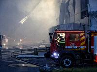 Rescuers are working at a civil enterprise damaged by a Russian missile attack in Odesa, Ukraine, on May 17, 2024. (