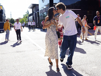 Charles Leclerc of Monaco and Ferrari SF-24 is kissing his girlfriend in the paddock prior to the Qualify of the Formula 1 Gran Premio of th...