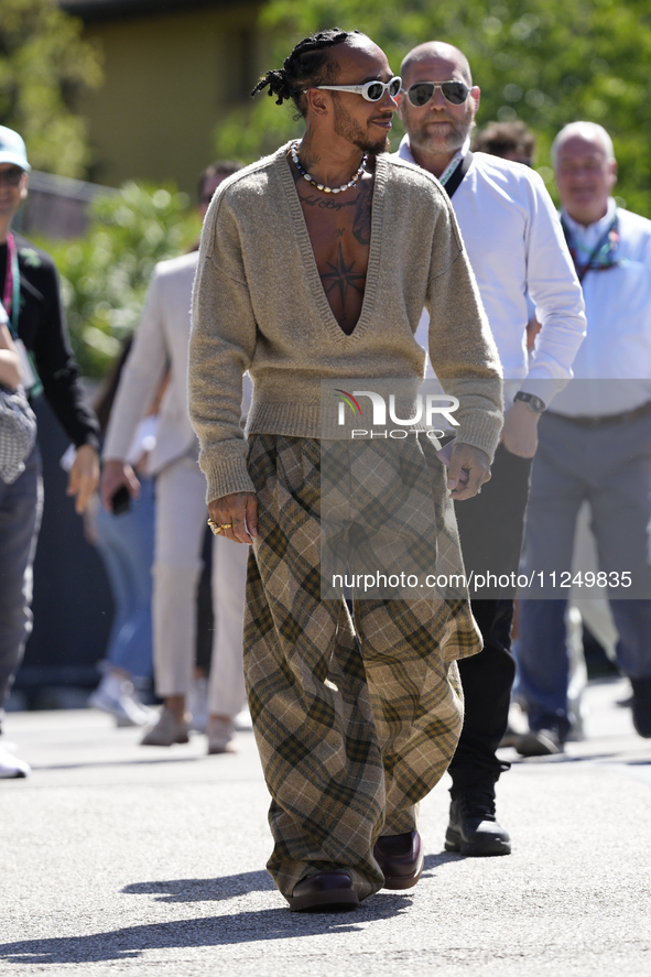 Lewis Hamilton of England and Mercedes AMG Petronas F1 Team W15 is walking on the paddock prior to the Qualify of the Formula 1 Gran Premio...