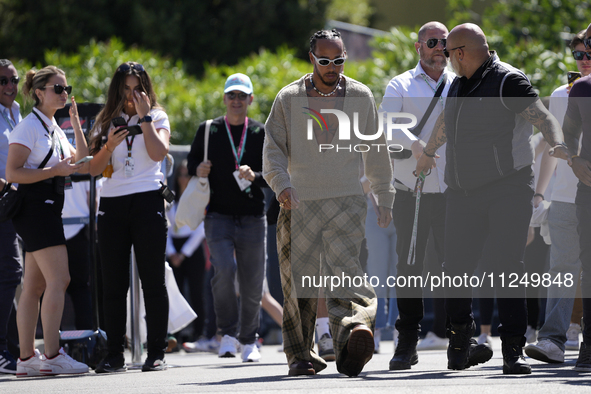 Lewis Hamilton of England and Mercedes AMG Petronas F1 Team W15 is walking on the paddock prior to the Qualify of the Formula 1 Gran Premio...