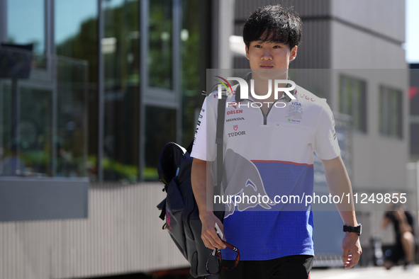 Yuki Tsunoda of Japan and Visa Cash App RB VCARB 01 are walking on the paddock prior to the Qualify of the Formula 1 Gran Premio of the Made...