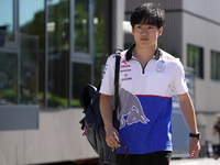 Yuki Tsunoda of Japan and Visa Cash App RB VCARB 01 are walking on the paddock prior to the Qualify of the Formula 1 Gran Premio of the Made...