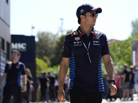 Sergio Perez of Mexico and Oracle Red Bull Racing RB20 are walking on the paddock prior to the Qualify of the Formula 1 Gran Premio of the M...