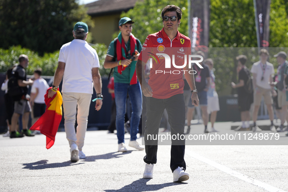 Carlos Sainz of Spain and Ferrari SF-24 are walking in the paddock prior to the Qualify of the Formula 1 Gran Premio of the Made in Italy an...