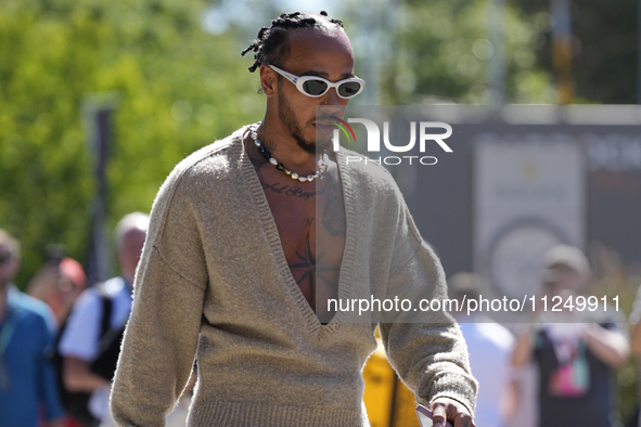 Lewis Hamilton of England and Mercedes AMG Petronas F1 Team W15 is walking on the paddock prior to the Qualify of the Formula 1 Gran Premio...