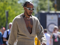 Lewis Hamilton of England and Mercedes AMG Petronas F1 Team W15 is walking on the paddock prior to the Qualify of the Formula 1 Gran Premio...