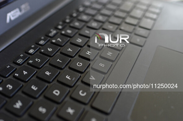 A close-up of a laptop from Taiwan-based electronics company ASUS is being seen in Manila, Philippines, on March 4, 2022. 