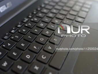 A close-up of a laptop from Taiwan-based electronics company ASUS is being seen in Manila, Philippines, on March 4, 2022. (