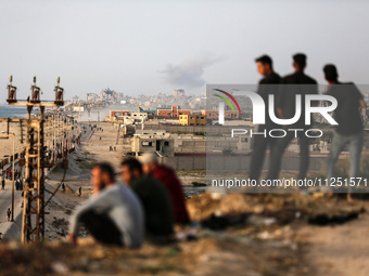 Smoke is billowing after Israeli bombardment in the central Gaza Strip on May 18, 2024, amid the ongoing conflict between Israel and the mil...