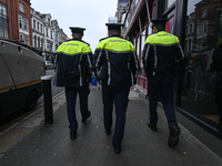 DUBLIN, IRELAND - MAY 18: 
Three members of the Garda Siochana (Irish Police) are patrolling in Dublin city center, on May 18, 2024, in Dubl...